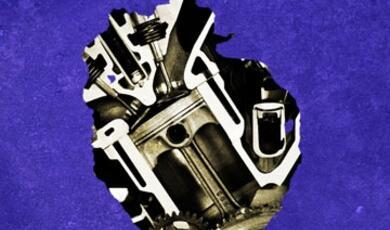A black and white image of an artificial heart on a deep purple background