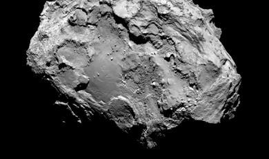 Black and white photograph of a comet