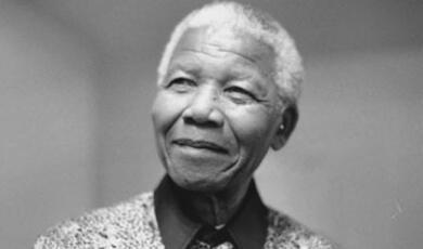 Black and white photograph of an older Nelson Mandela