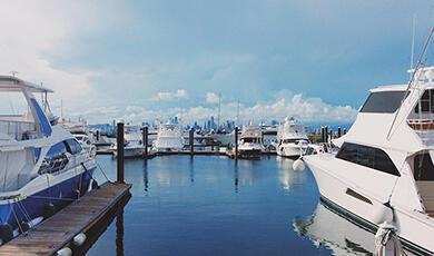 Yachts by a wooden jetty