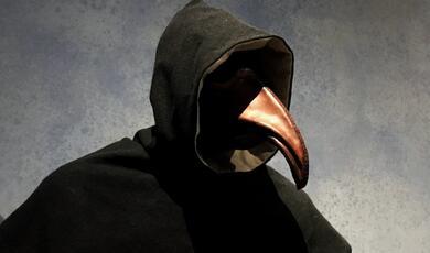 Plague doctor outfit with beak-like mask