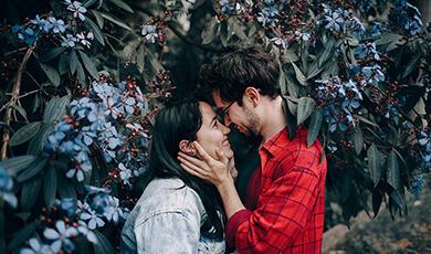 Man and woman about to kiss
