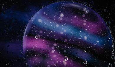 An experiment with water, cooking oil and different colour patterns to create an image of a bubble that resembles Jupiter