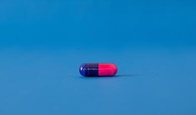 Red and blue pill capsule
