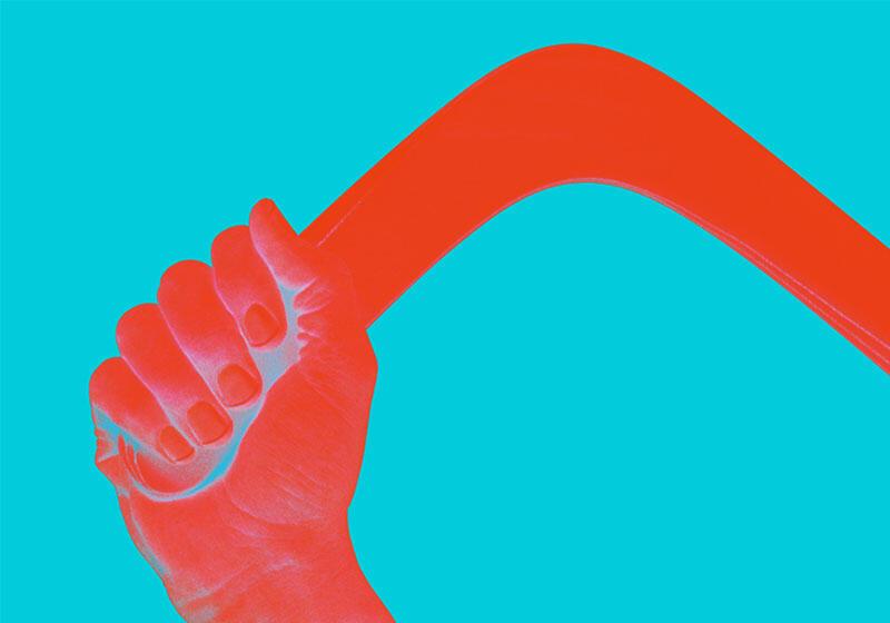 neon abstract image of hand holding boomerang