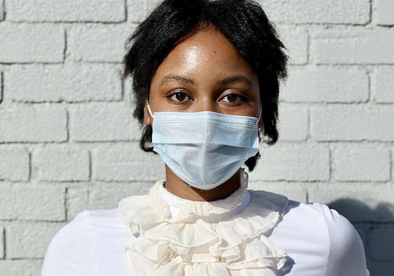 Black lady wearing mask