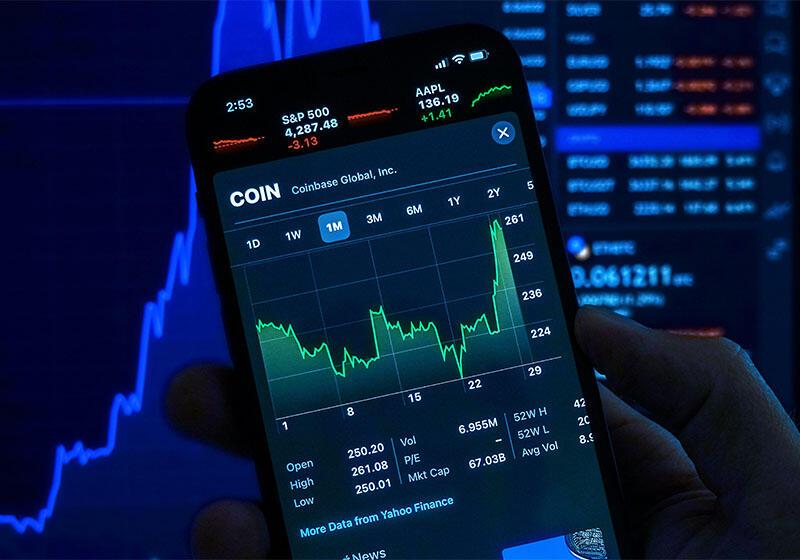 a person looking at the share price of a stock on their smartphone