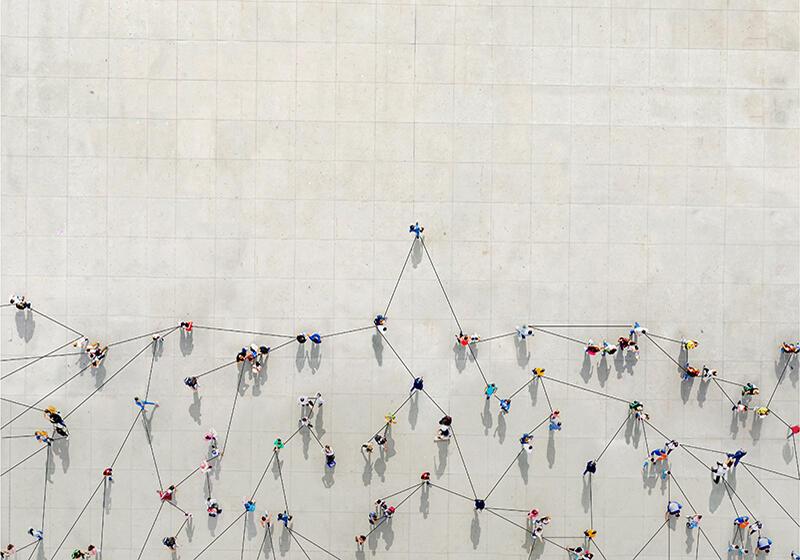 a birds eye view of people in a crowd with lines connecting each of them