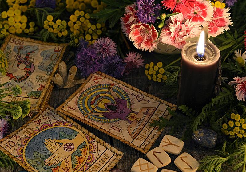 Tarot cards in a candle