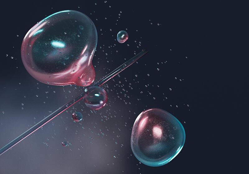 Abstract image featuring translucent, glowing bubbles in shades of pink and blue, suspended around a thin diagonal line against a dark background
