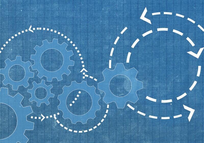 A blueprint-style blue background with a subtle grid pattern features white outlines of five interlocking gears on the left and centre. White dashed lines with directional arrowheads form circular loops that trace around and through the gears