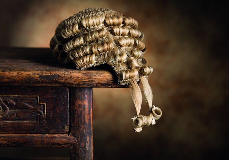 Barrister's wig on table