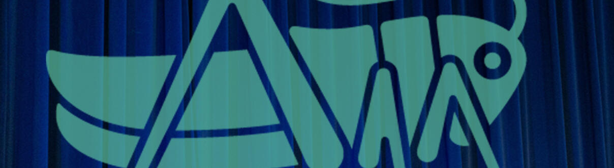 Gresham Grasshopper on blue curtain