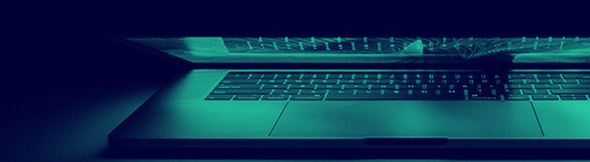 Lap top slightly open with glimpse of screen