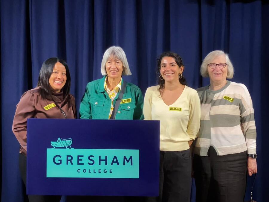 Four of our volunteers manning Open House 2026