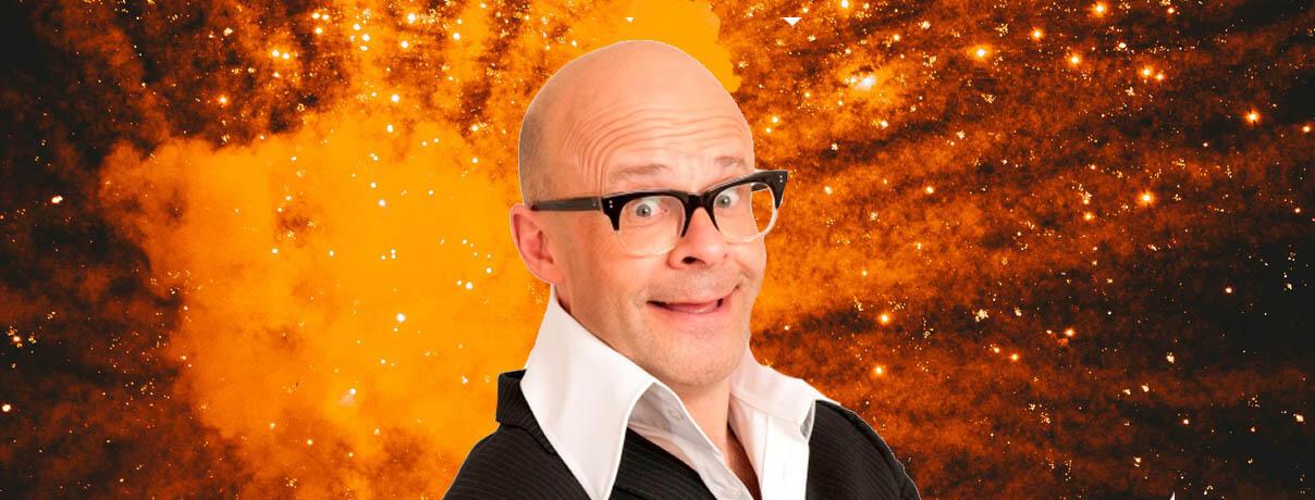 Harry Hill with Big bang in backgroun
