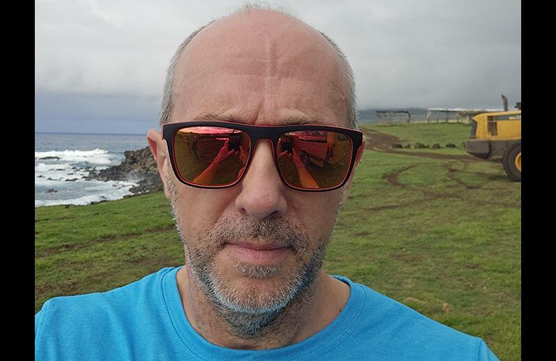 Hands holding a light bulb