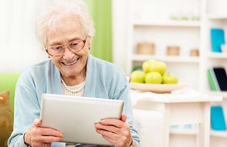 Hands holding a light bulb