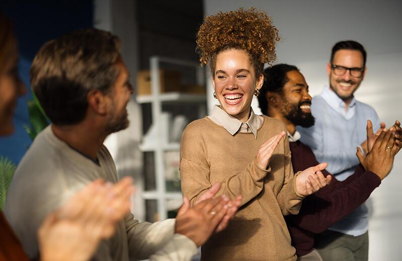 Smiling lady laughing with friends