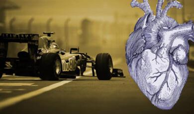 a yellow tinted photograph of a formula 1 car with an image of a heart
