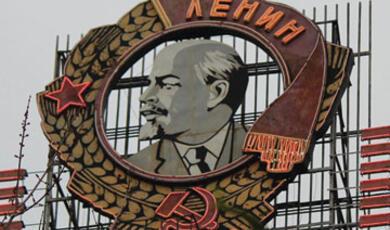 Billboard shaped as Soviet order of Lenin medal with Lenin's profile at centre