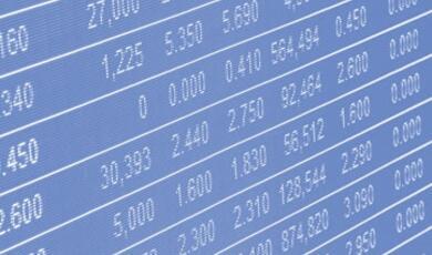 A blue digital display showing financial data