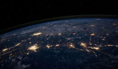 Image of earth surface with electric lights visible