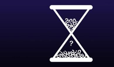 An hourglass against purple background