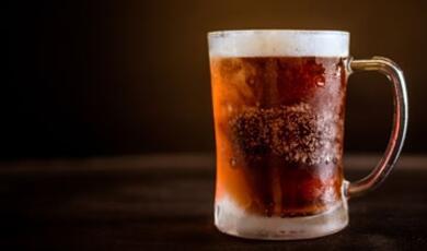 Pint of beer on table