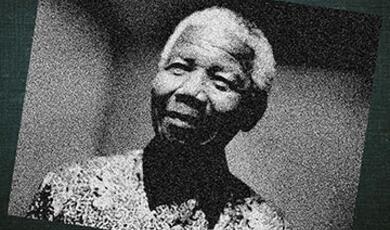 Black and white photograph of an older Nelson Mandela