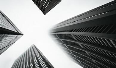 Looking up at skyscrapers