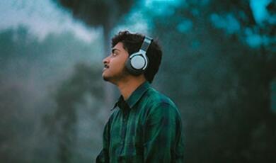 calm man wearing headphones