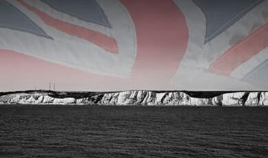 British flag backdrop with cliffs of Dover in foreground