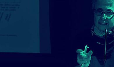 close up of female speaker giving lecture