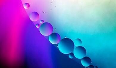 abstract, turquoise fade to pink and purple with circular pattern