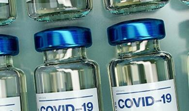 drug bottles with Covid-19 on labels