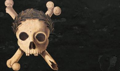 a skull and cross bones on a black background