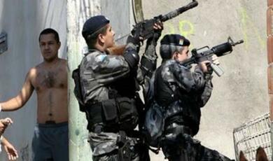 Police with guns raised in Rio de Janeiro