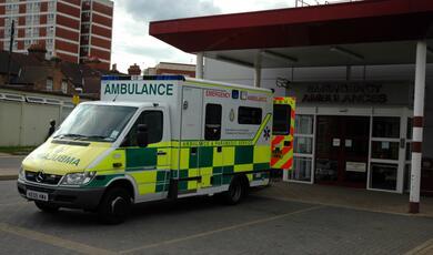 an ambulance parked outside a hospital