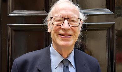 blue and green image, inside mechanism of a clock or watch