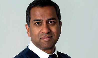 blue and green image, inside mechanism of a clock or watch