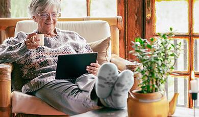 Hands holding a light bulb