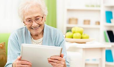 Hands holding a light bulb