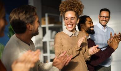 Smiling lady laughing with friends