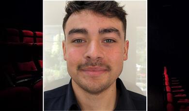 Hands holding a lightbulb