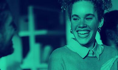 Smiling lady laughing with friends