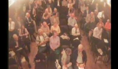 Still of Gresham audience at lecture