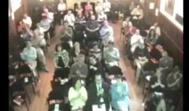 Still of Gresham audience at lecture