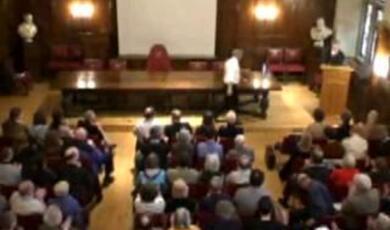 Still of Gresham audience at lecture