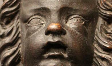 close up photograph of sculpture of infant